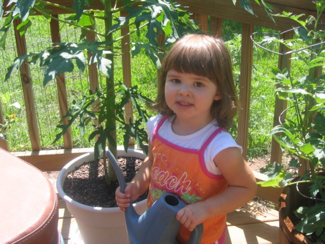 helpingtowatertheflowersjune2006.jpg