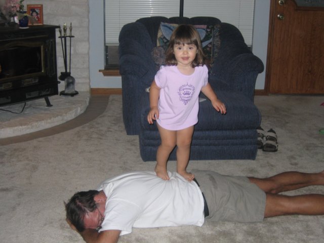 skyegivespapaamuchneededbackmassagejuly2006.jpg